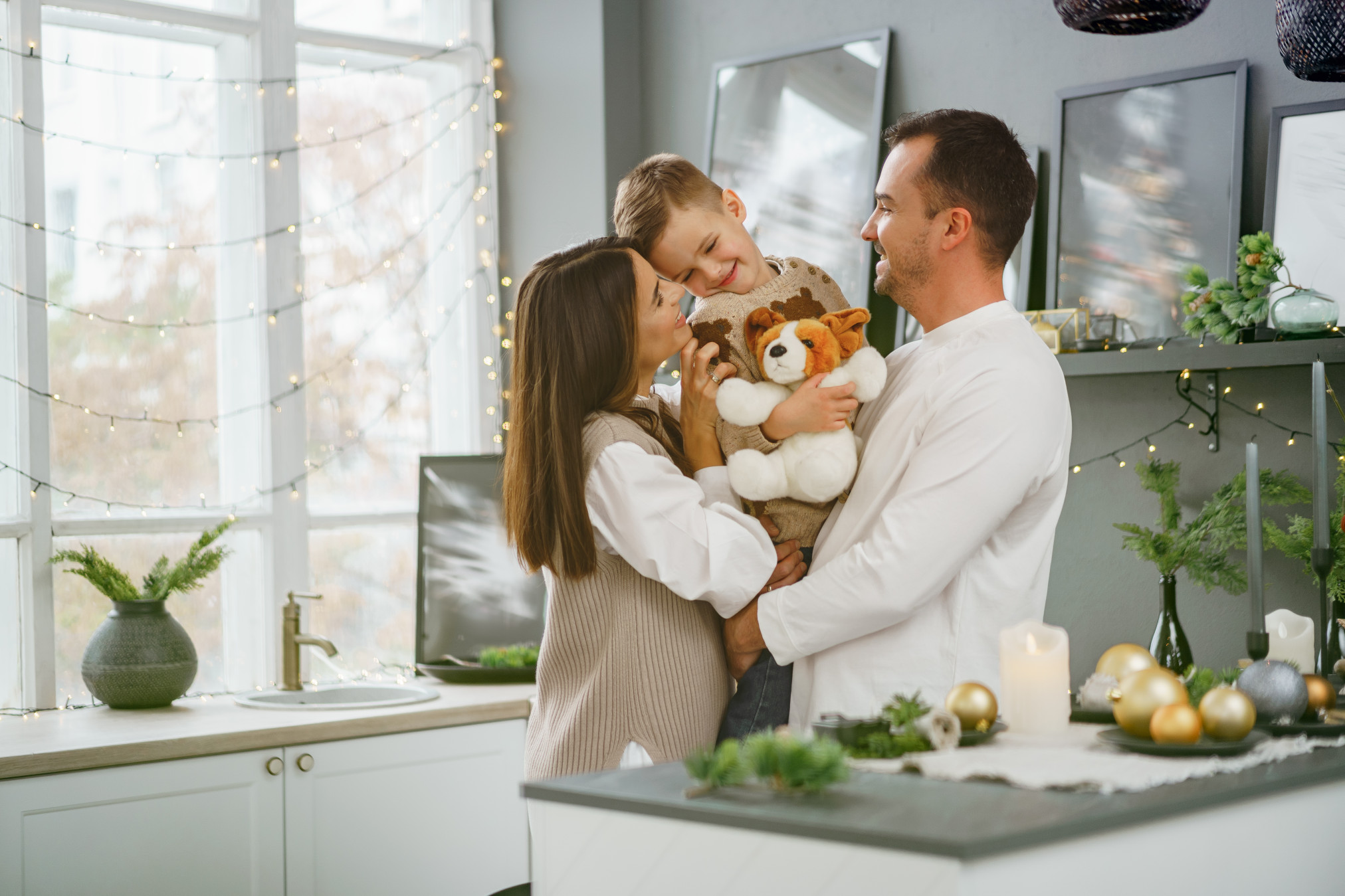 a-portrait-of-happy-family-in-the-kitchen-decorated-for-christmas.jpg